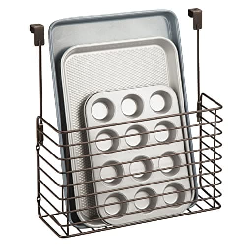 mDesign Over The Cupboard Hanging Storage Basket - Metal Bakeware Organiser and Cutting Board Holder - Excellent Kitchen Storage Solution - Bronze